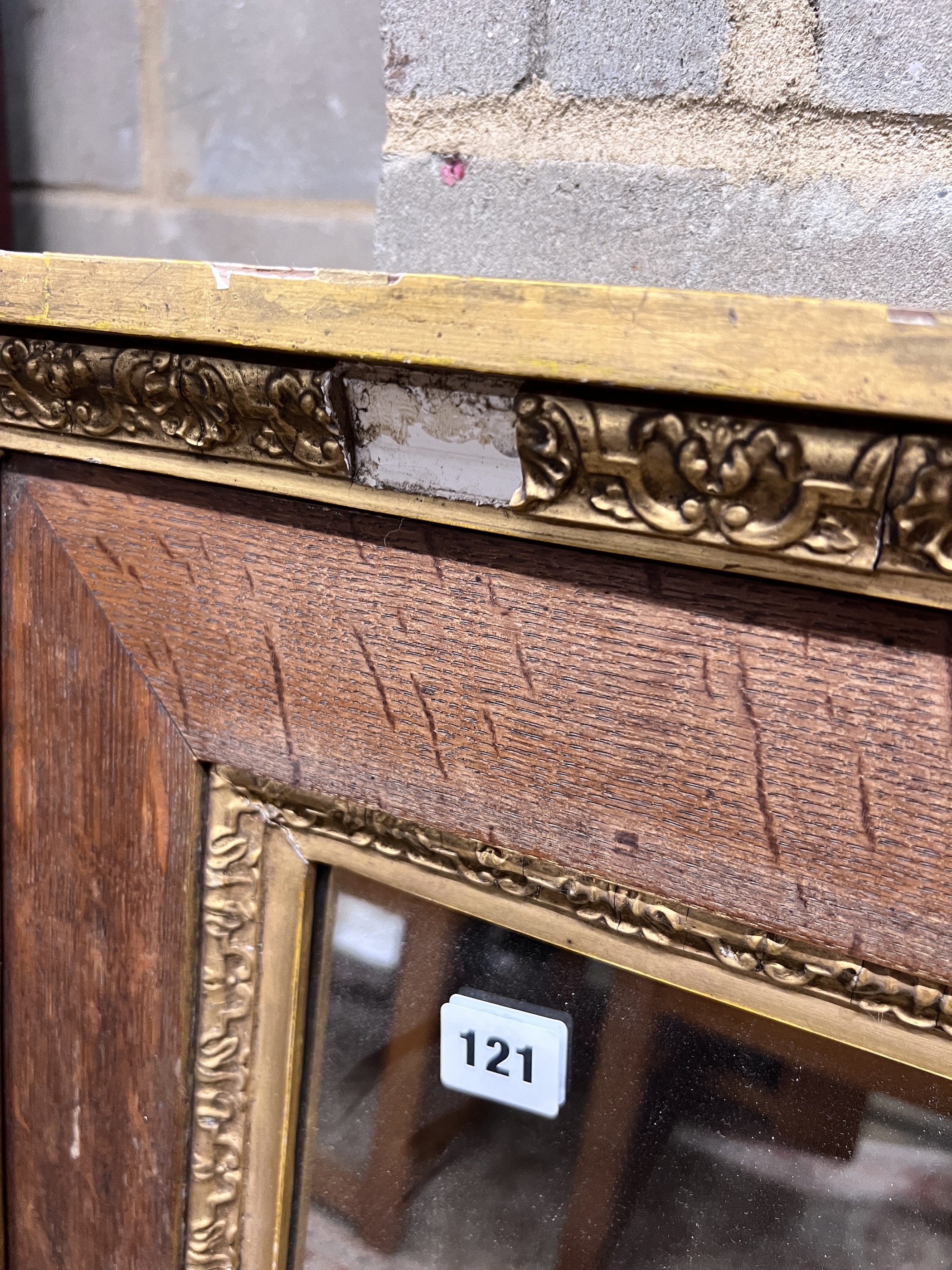 A Victorian rectangular oak and gilt composition wall mirror, width 76cm, height 87cm